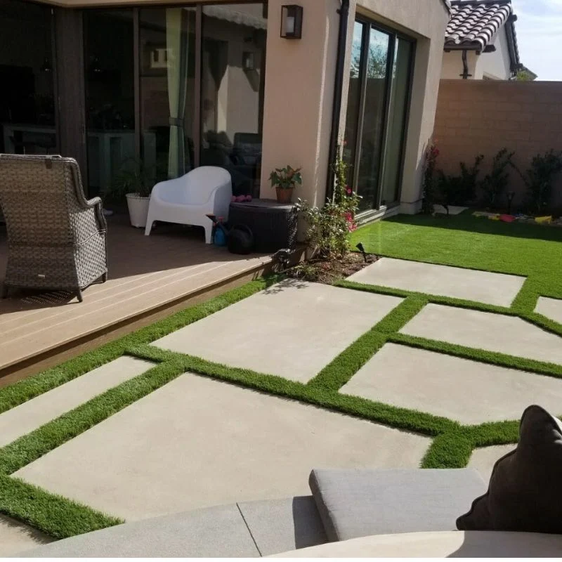 fake grass and pavers installed at a home in Huntington Beach California