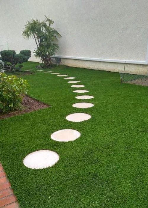 Stepping stones with artificial grass