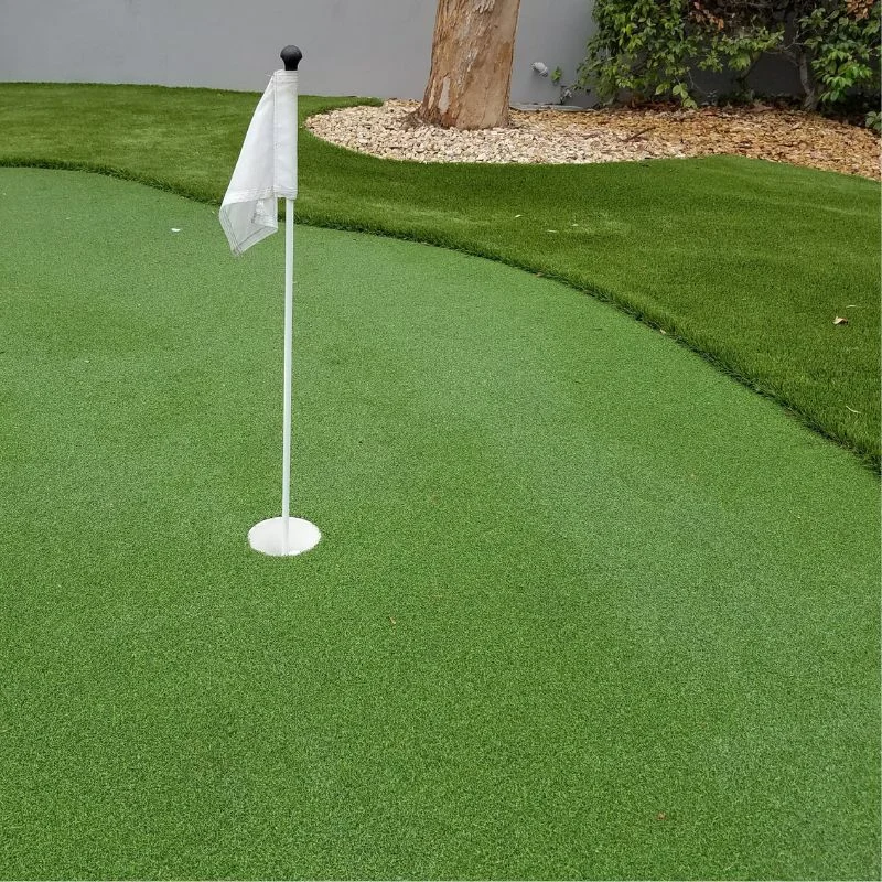 A putting green in a backyard in Orange County California